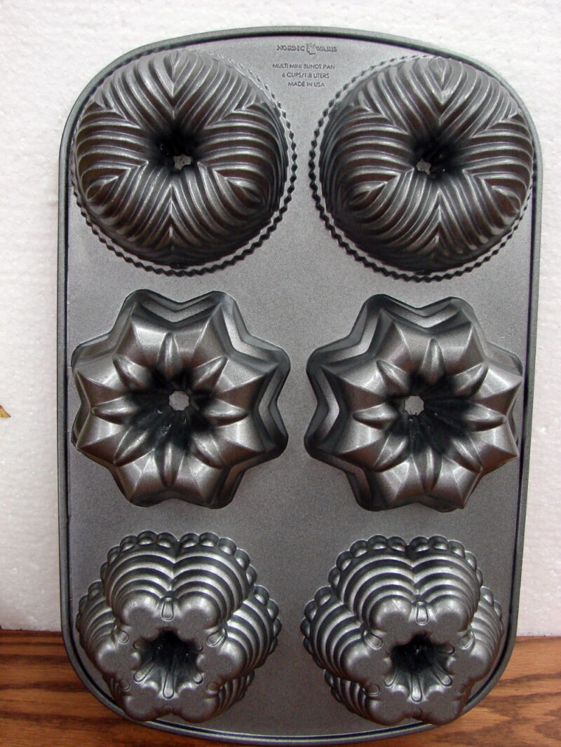 Scandinavian Nordic Ware Heavy Duty Bundt Mini Loaf Bundt-lette Baking Pan, Moose-R-Us.Com Log Cabin Decor