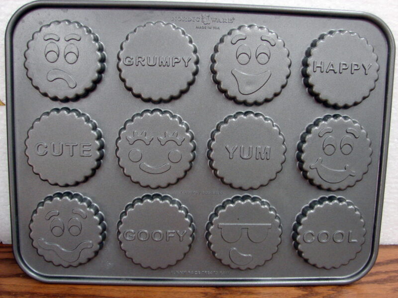 Scandinavian Nordic Ware Heavy Duty Funny Faces Treat Baking Pan Filled Cookies, Moose-R-Us.Com Log Cabin Decor