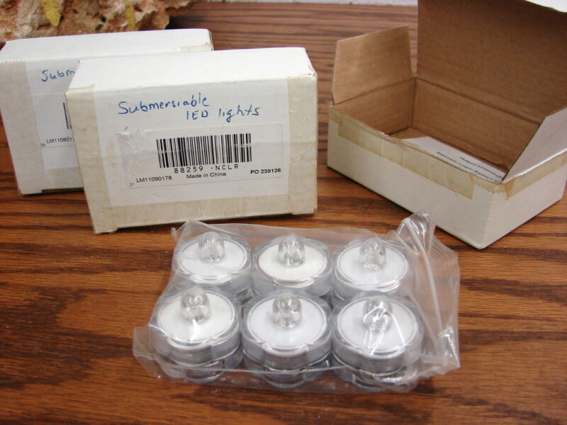 Brand New Set/18 Submersible LED Tea Lights, Moose-R-Us.Com Log Cabin Decor